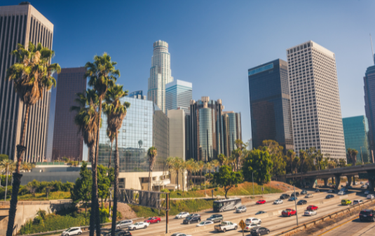 Los Angeles Nonprofit Staffing & Recruiting Agency image of downtown Los Angeles and highway with cars driving on it